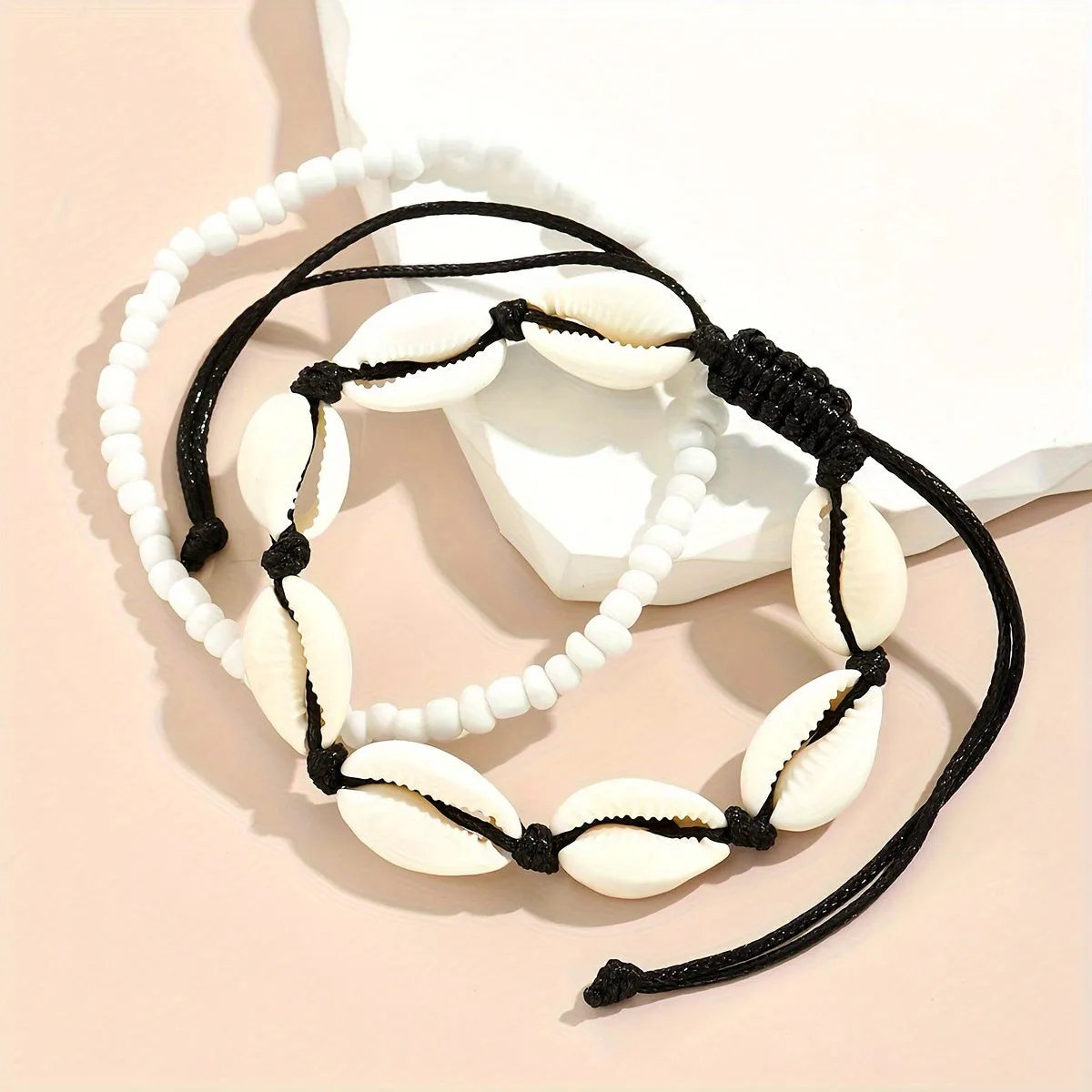 Oceaninspired beaded anklet set with shellshaped beads