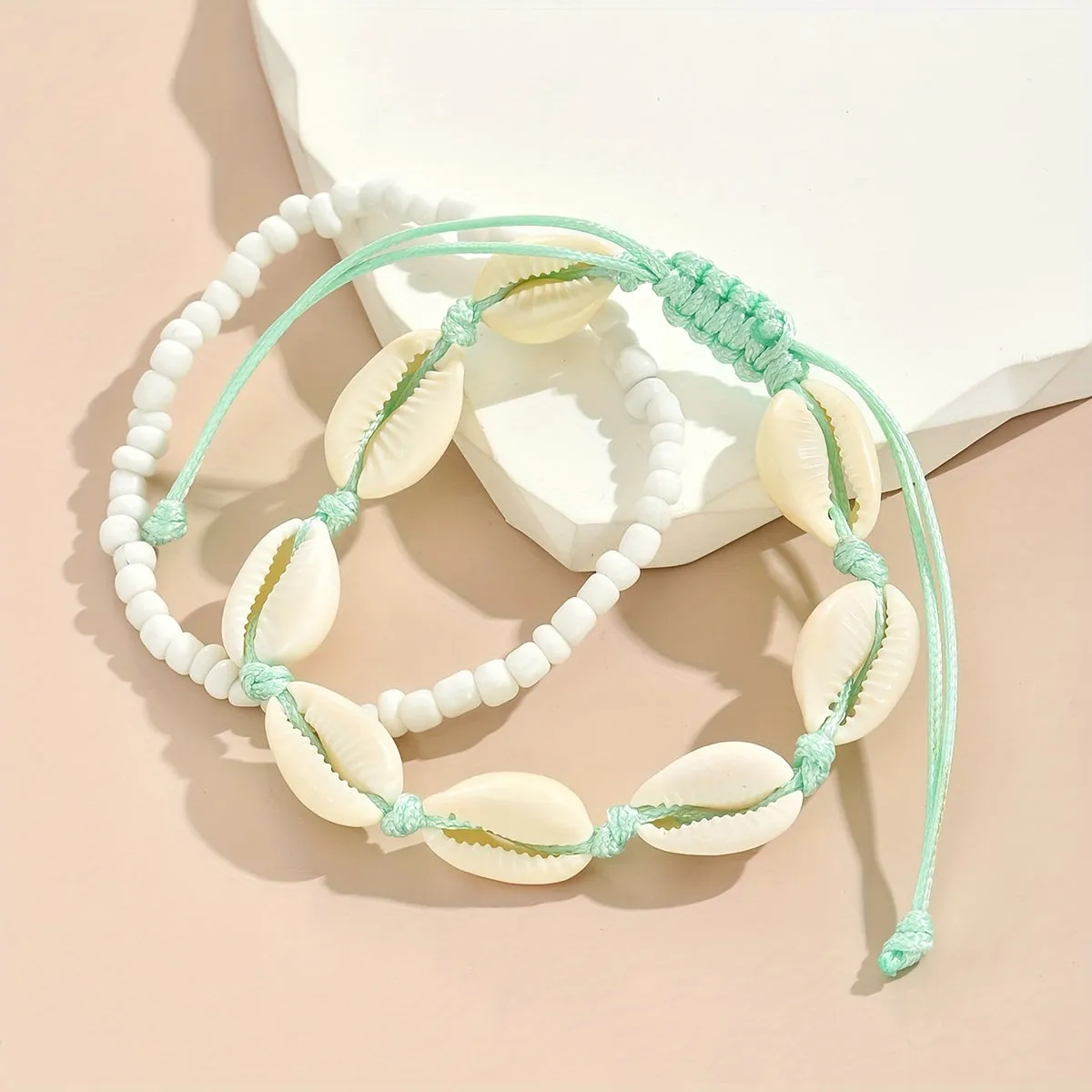 Oceaninspired beaded anklet set with shellshaped beads